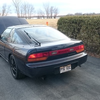 Blue 1992 Nissan 200SX on Black Rota Torque