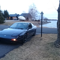 Blue 1992 Nissan 200SX on Black Rota Torque
