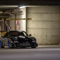 Black 1993 Mazda RX-7 on Blue Volk Racing TE37
