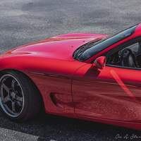 Red 1993 Mazda RX-7 on Gray Advan Racing GT