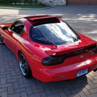 Red 1993 Mazda RX-7 on Gray Advan Racing GT