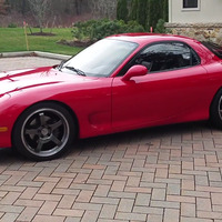 Red 1993 Mazda RX-7 on Gray Advan Racing GT