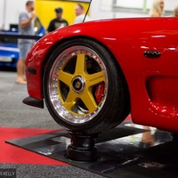 Red 1994 Mazda RX-7 on Gold Mazdaspeed MS-01