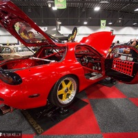 Red 1994 Mazda RX-7 on Gold Mazdaspeed MS-01