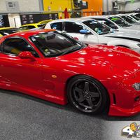 Red 1992 Mazda RX-7 on Brown Rota Grid-V