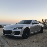 Silver/Chrome 2009 Mazda RX-8 on Black Enkei Raijin