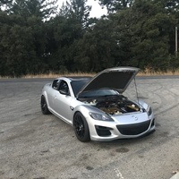Silver/Chrome 2009 Mazda RX-8 on Black Enkei Raijin