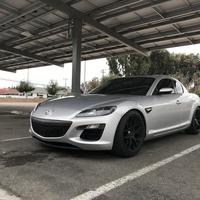 Silver/Chrome 2009 Mazda RX-8 on Black Enkei Raijin