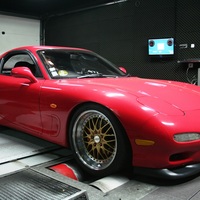 Red 1994 Mazda RX-7 on Gold Kerscher CS