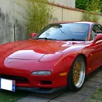 Red 1994 Mazda RX-7 on Gold Kerscher CS