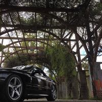 Black 1990 Mazda RX-7 on Silver/Chrome Enkei Kojin