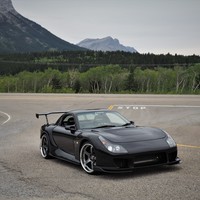 Black 1996 Mazda RX-7 on Gray Advan Racing GT