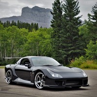 Black 1996 Mazda RX-7 on Gray Advan Racing GT