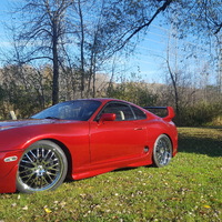 Red 1994 Toyota Supra on Silver/Chrome TSW Snetterton