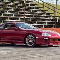 Red 1994 Toyota Supra on Silver/Chrome TSW Snetterton