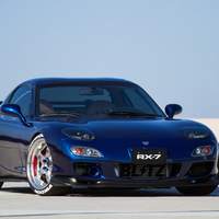 Blue 1993 Mazda RX-7 on Silver/Chrome Work Meister S1R