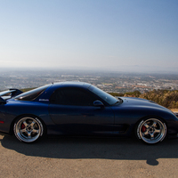 Blue 1993 Mazda RX-7 on Silver/Chrome Work Meister S1R