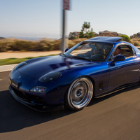 Blue 1993 Mazda RX-7 on Silver/Chrome Work Meister S1R