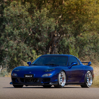 Blue 1993 Mazda RX-7 on Silver/Chrome Work Meister S1R