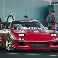 Red 1993 Mazda RX-7 on Gold Volk Racing TE37
