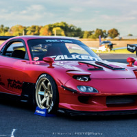 Red 1993 Mazda RX-7 on Gold Volk Racing TE37
