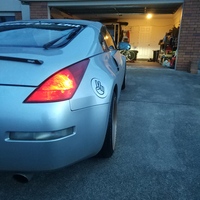 Silver/Chrome 2003 Nissan 350Z on Black Rota GTR-D