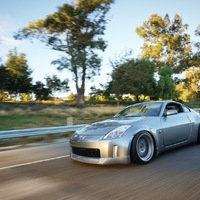 Gray 2003 Nissan 350Z on Gray Cosmis XT-206R
