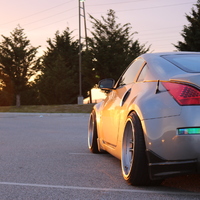 Gray 2003 Nissan 350Z on Gray Cosmis XT-206R