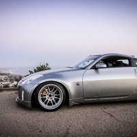 Gray 2003 Nissan 350Z on Gray Cosmis XT-206R