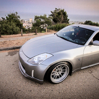 Gray 2003 Nissan 350Z on Gray Cosmis XT-206R