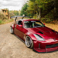 Red 2007 Nissan 350Z on Black Napre Japan Medusa