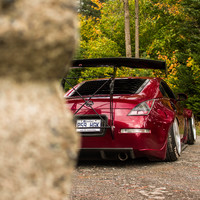 Red 2007 Nissan 350Z on Black Napre Japan Medusa