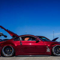 Red 2007 Nissan 350Z on Black Napre Japan Medusa