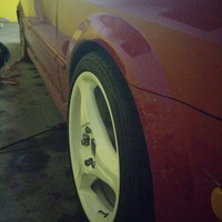 Red 2002 Mazda Protege5 on White SSR Sport Design Three