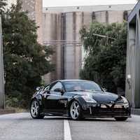 Black 2005 Nissan 350Z on Silver/Chrome Nismo LM GT4