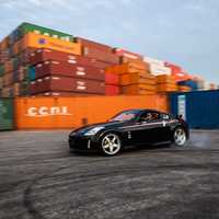 Black 2005 Nissan 350Z on Silver/Chrome Nismo LM GT4