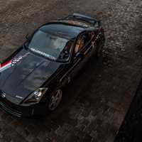 Black 2005 Nissan 350Z on Silver/Chrome Nismo LM GT4