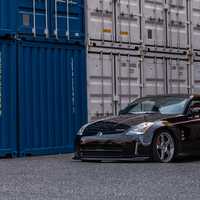Black 2005 Nissan 350Z on Silver/Chrome Nismo LM GT4