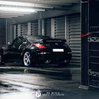 Black 2005 Nissan 350Z on Silver/Chrome Nismo LM GT4