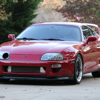 Red 1995 Toyota Supra on Black CCW Classic