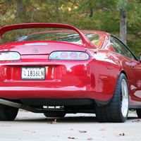 Red 1995 Toyota Supra on Black CCW Classic