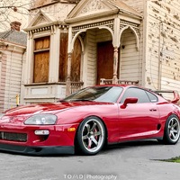 Red 1996 Toyota Supra on Black Volk Racing TE37