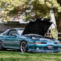 Teal 1992 Toyota Supra on Black Volk Racing TE37