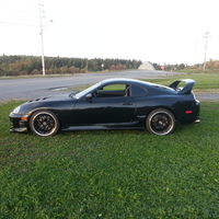 Black 1994 Toyota Supra on Black Stern ST1