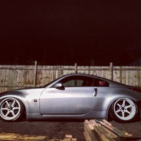 Silver/Chrome 2003 Nissan 350Z on White Cosmis XT-206R