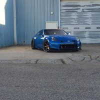 Blue 2009 Nissan 370Z on Bronze Varrstoen ES2