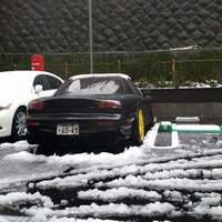 Black 1993 Mazda RX-7 on Yellow Enkei PF01