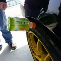 Black 1993 Mazda RX-7 on Yellow Enkei PF01