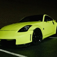 Yellow 2006 Nissan 350Z on Black Work Emotion CR-KAI