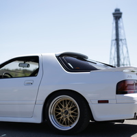 White 1988 Mazda RX-7 on Gold JNC 005